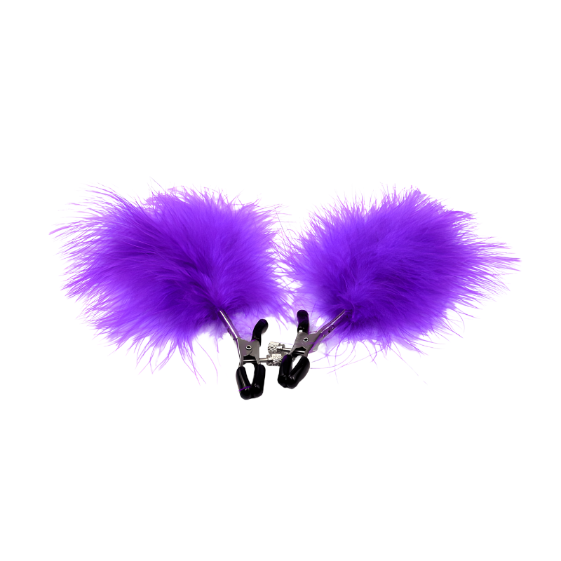 Purple fluffy feather attached to nipple clips on a white background