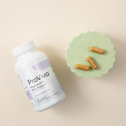 ProViva supplement bottle with capsules on a beige background